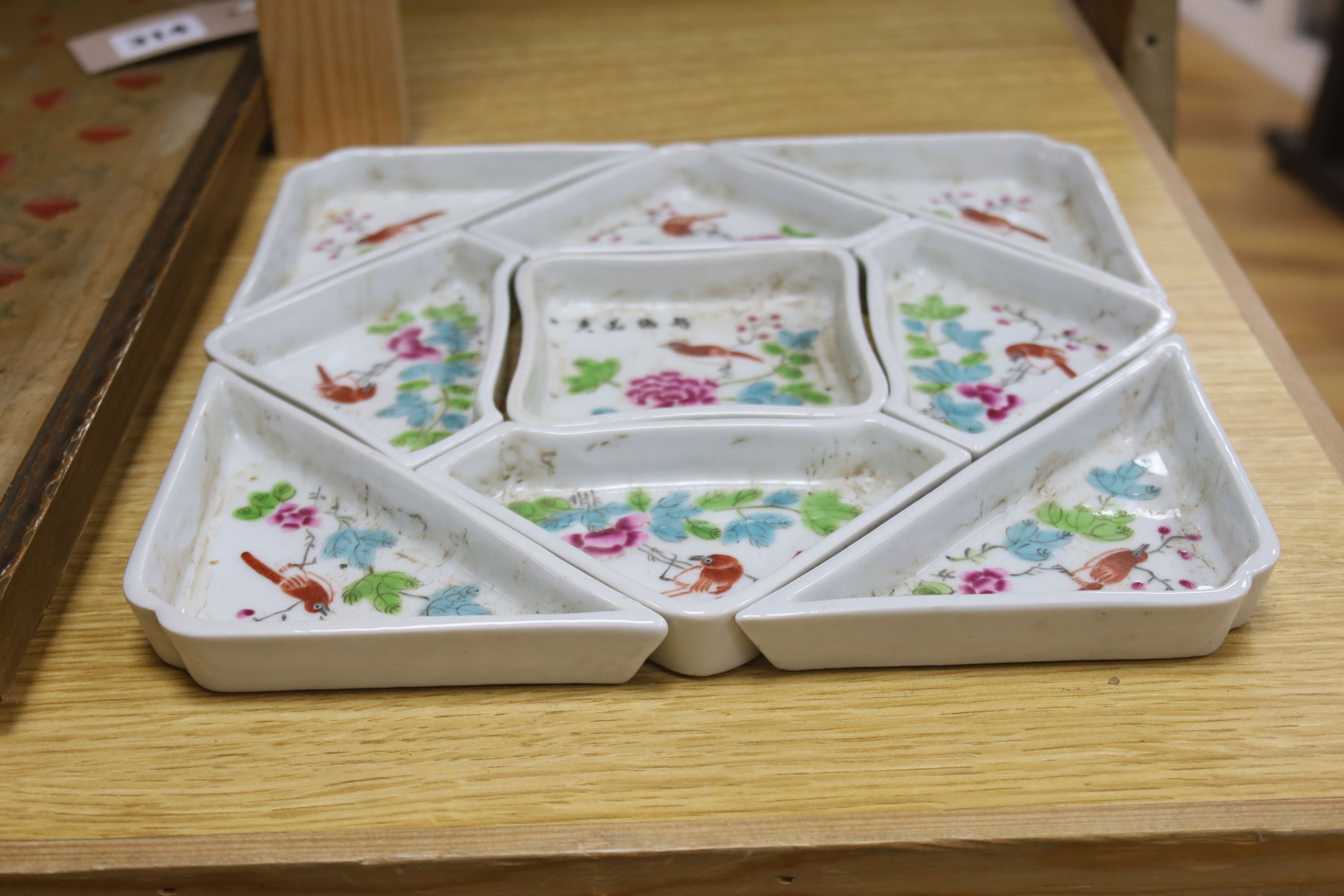 A Chinese famille rose nine piece supper set